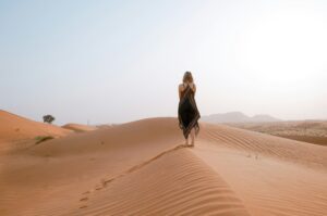 Woman reflecting on awareness, old patterns, and identity change