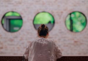 Woman reflecting on finding a different kind of space for personal growth