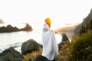 Woman remembering who she is through deep consciousness coaching and energy healing